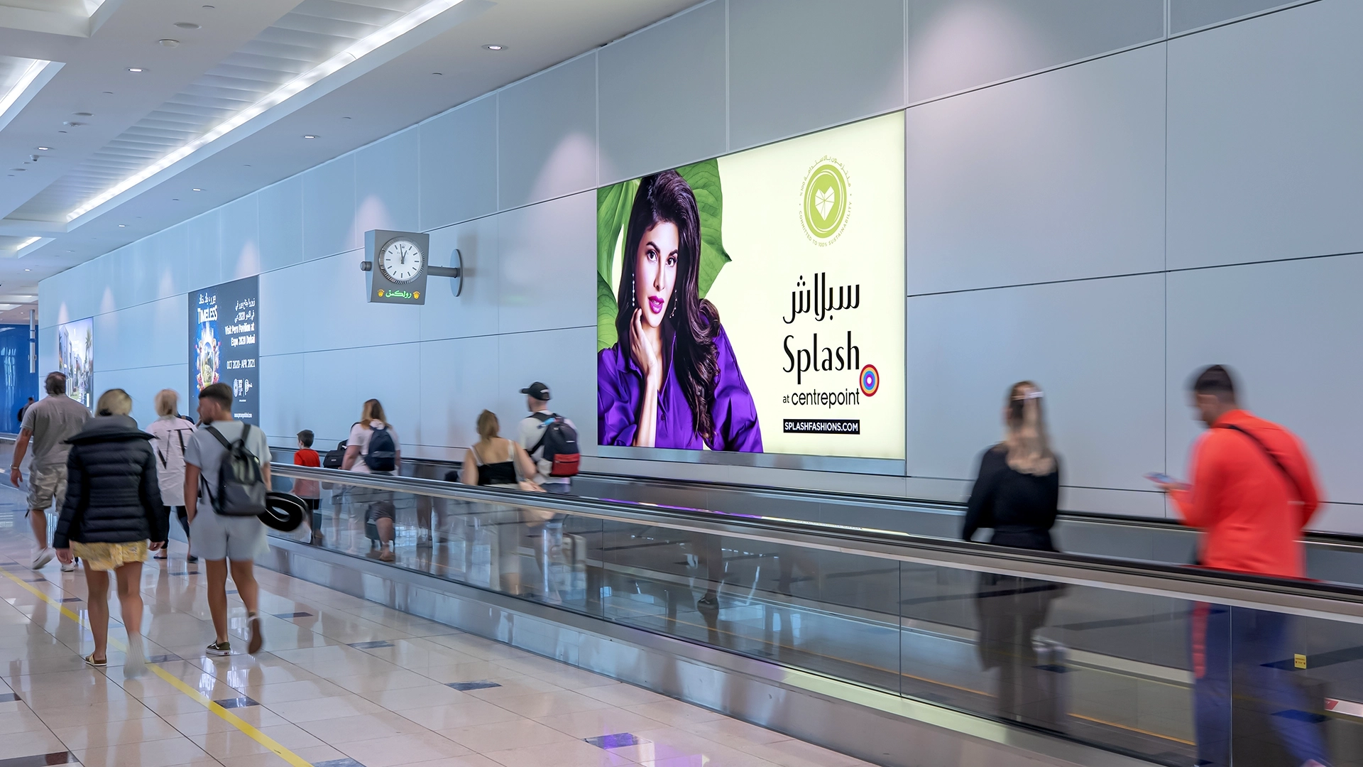 A digital billboard advert for Splash clothing at Centerpoint in Dubai International Airport