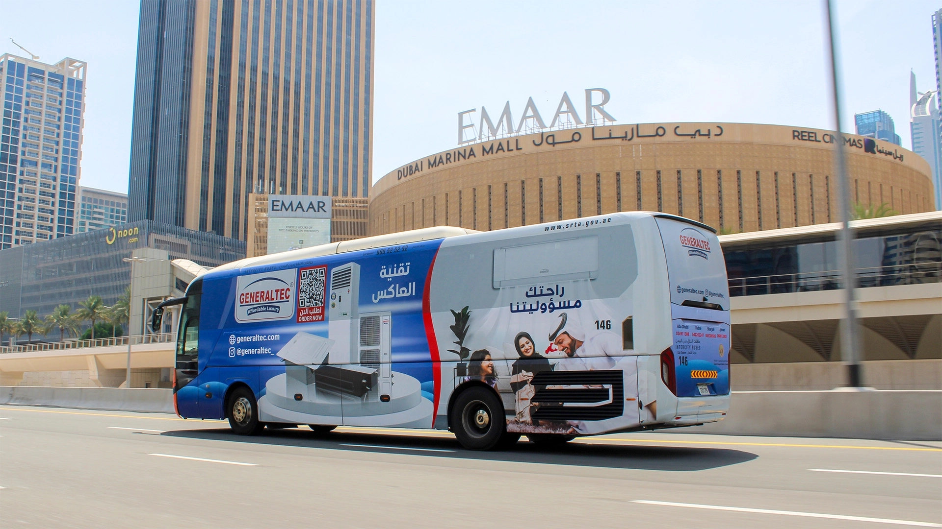 A fully wrapped bus targets residents and tourists by Dubai Marina Mall