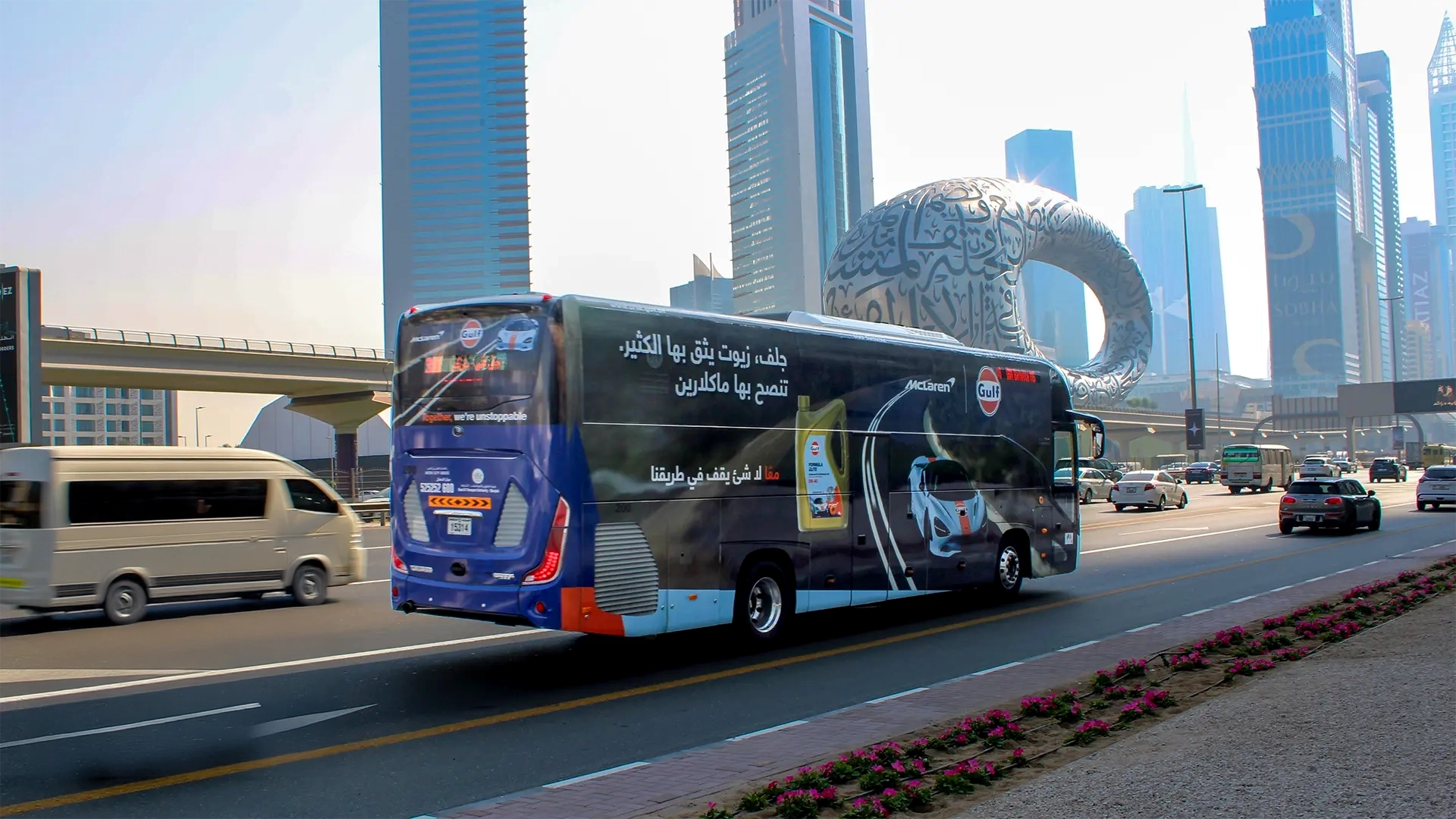 A bus branded with McLaren and Gulf passes by the Museum of the Future on Sheikh Zayed Road in Dubai