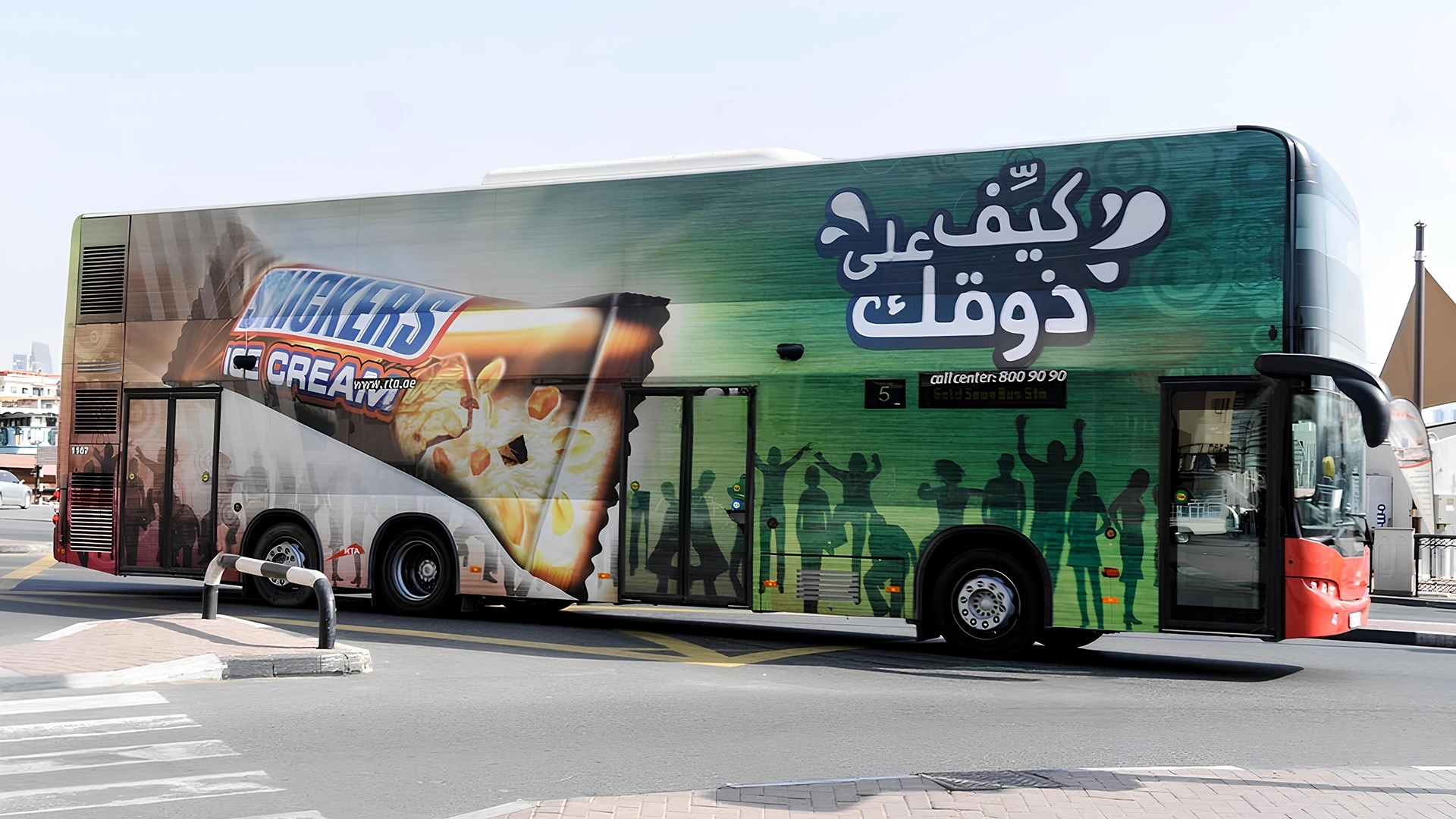 An epic bus wrap for Snickers Ice Cream travels through Dubai