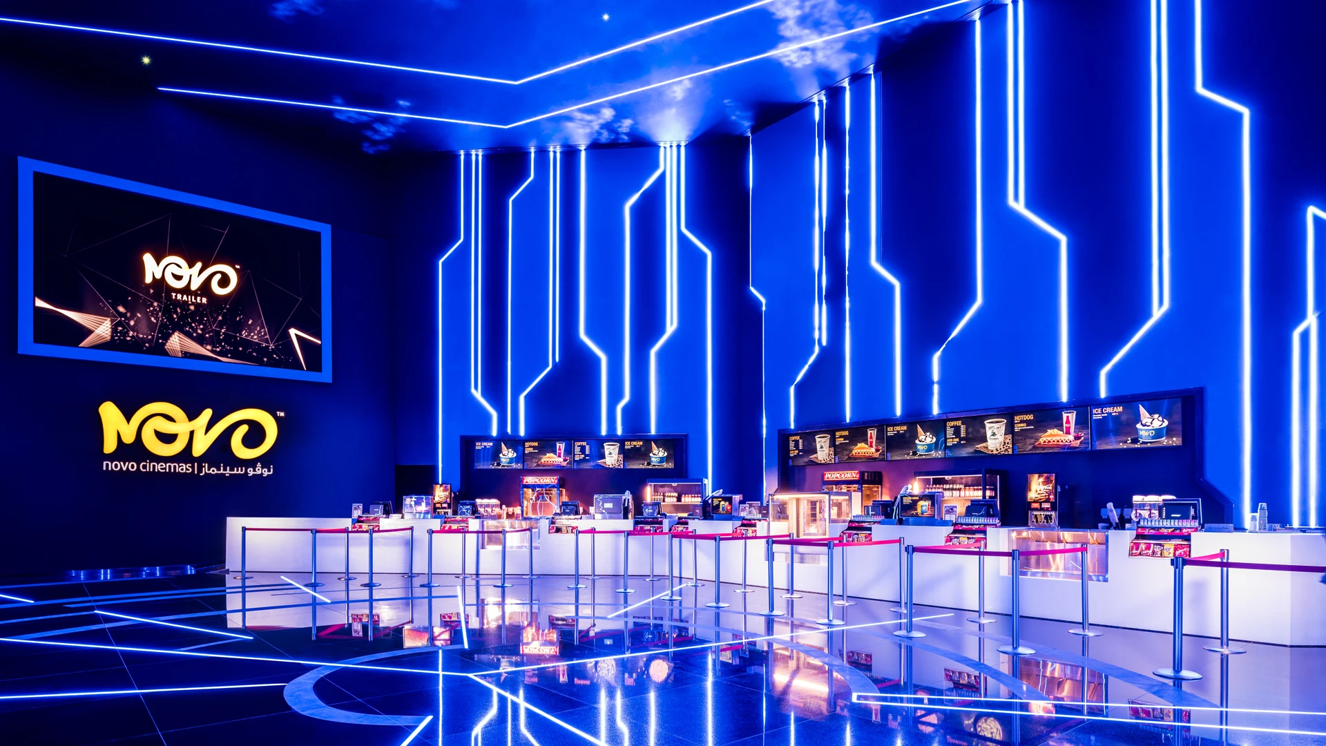 A luxury cinema with branded seating and immersive ad visuals