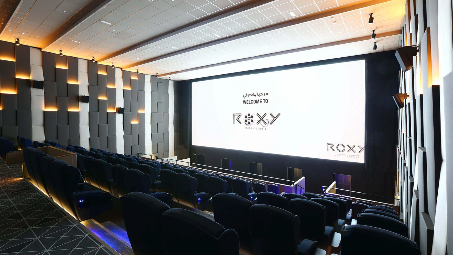 A product sampling booth at a Dubai cinema entrance