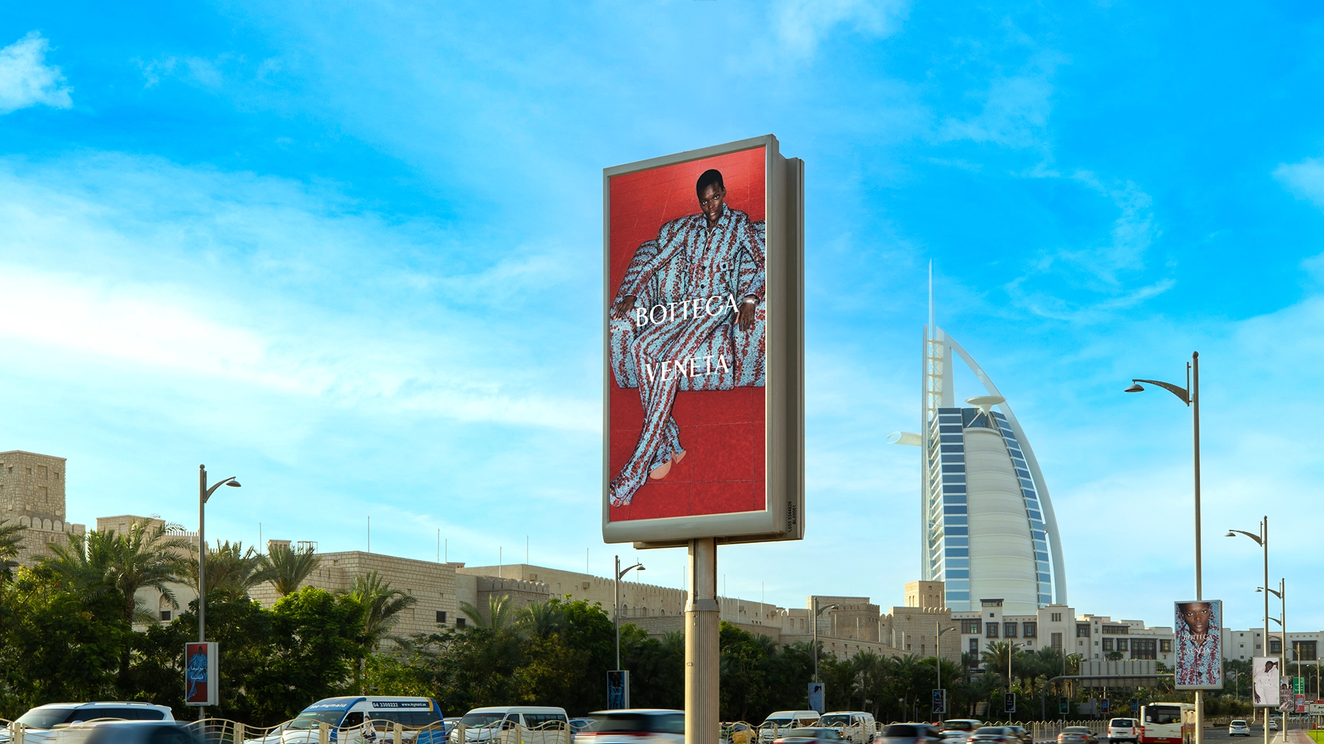 A striking lamppost advert for Bottega Veneta with the Burj Al Arab in the background