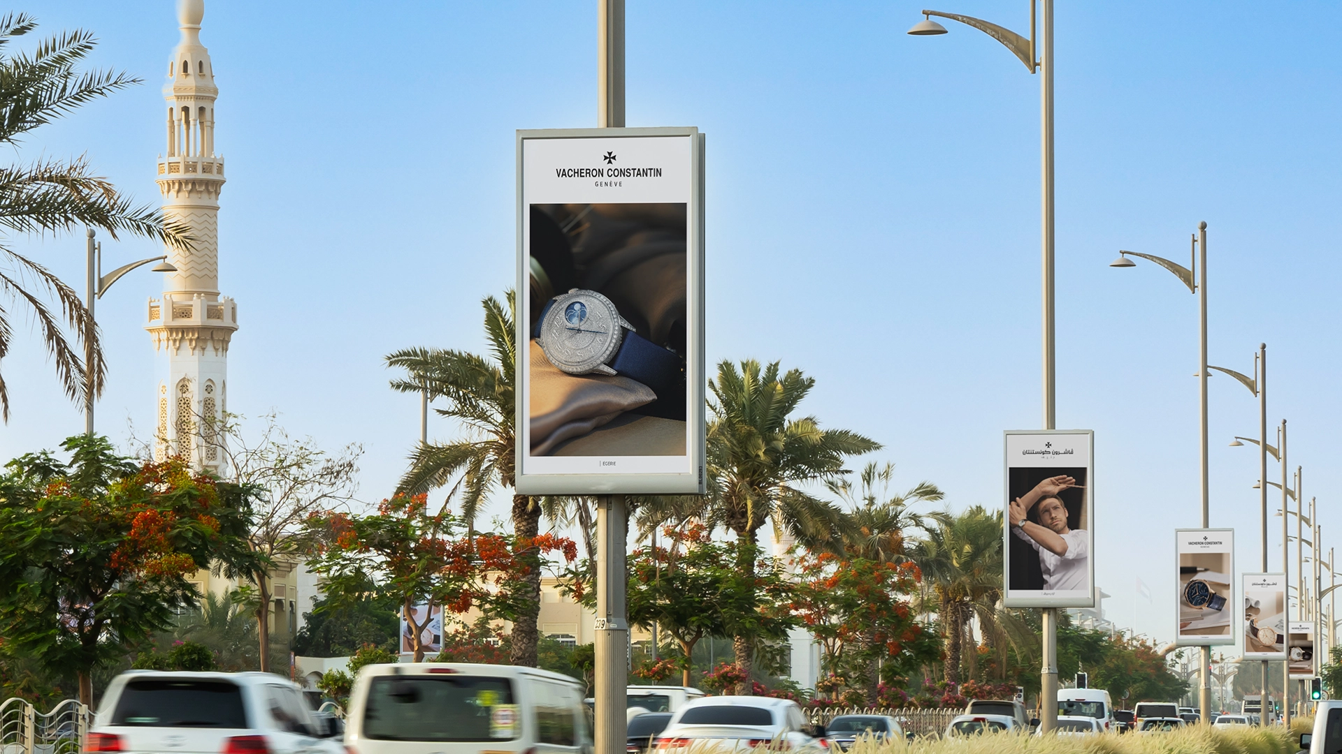 A series of adverts for Vacheron Constantin on a premium road in Dubai with local architecture in the background