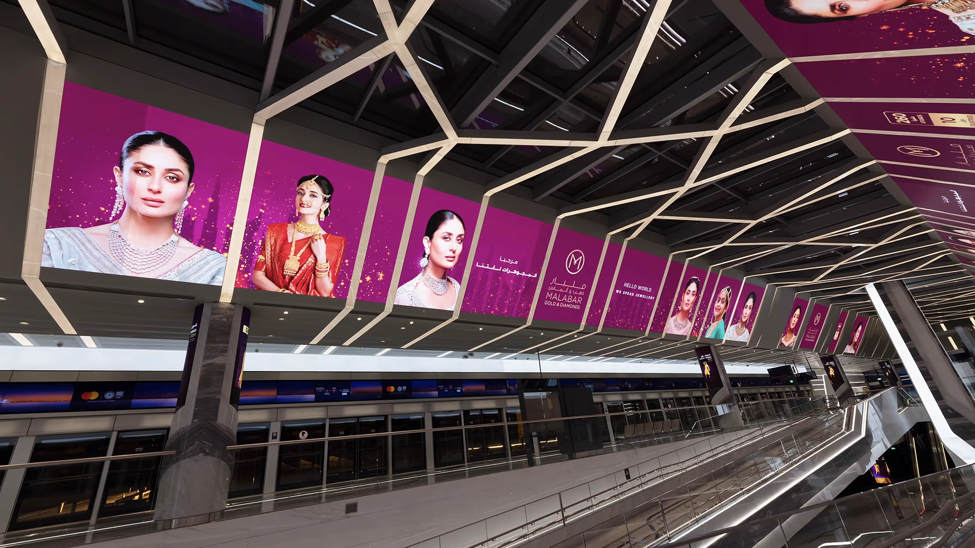 Eye-catching branding for Malabar Gold in the roof elements of a Dubai Metro station