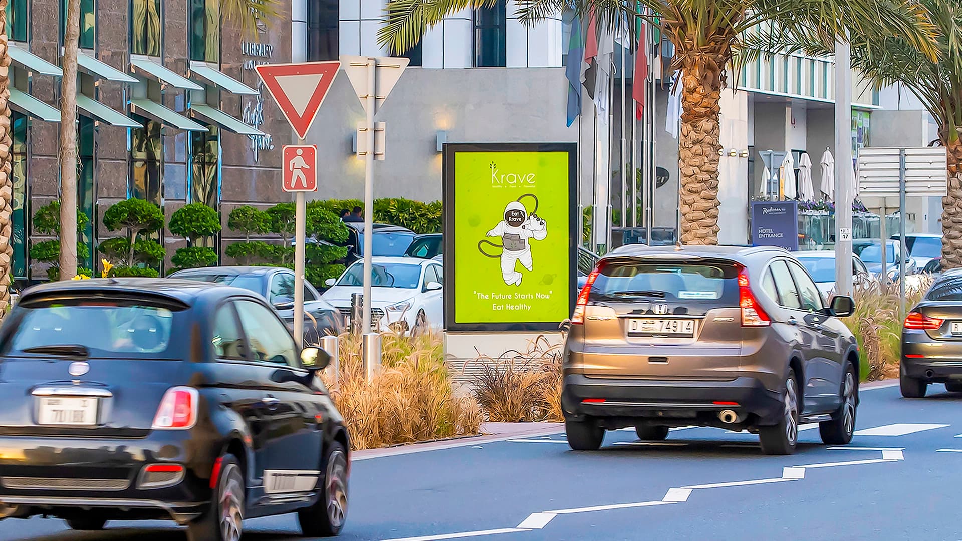 A mupi advert for Krave food targets motorists on a busy Dubai road