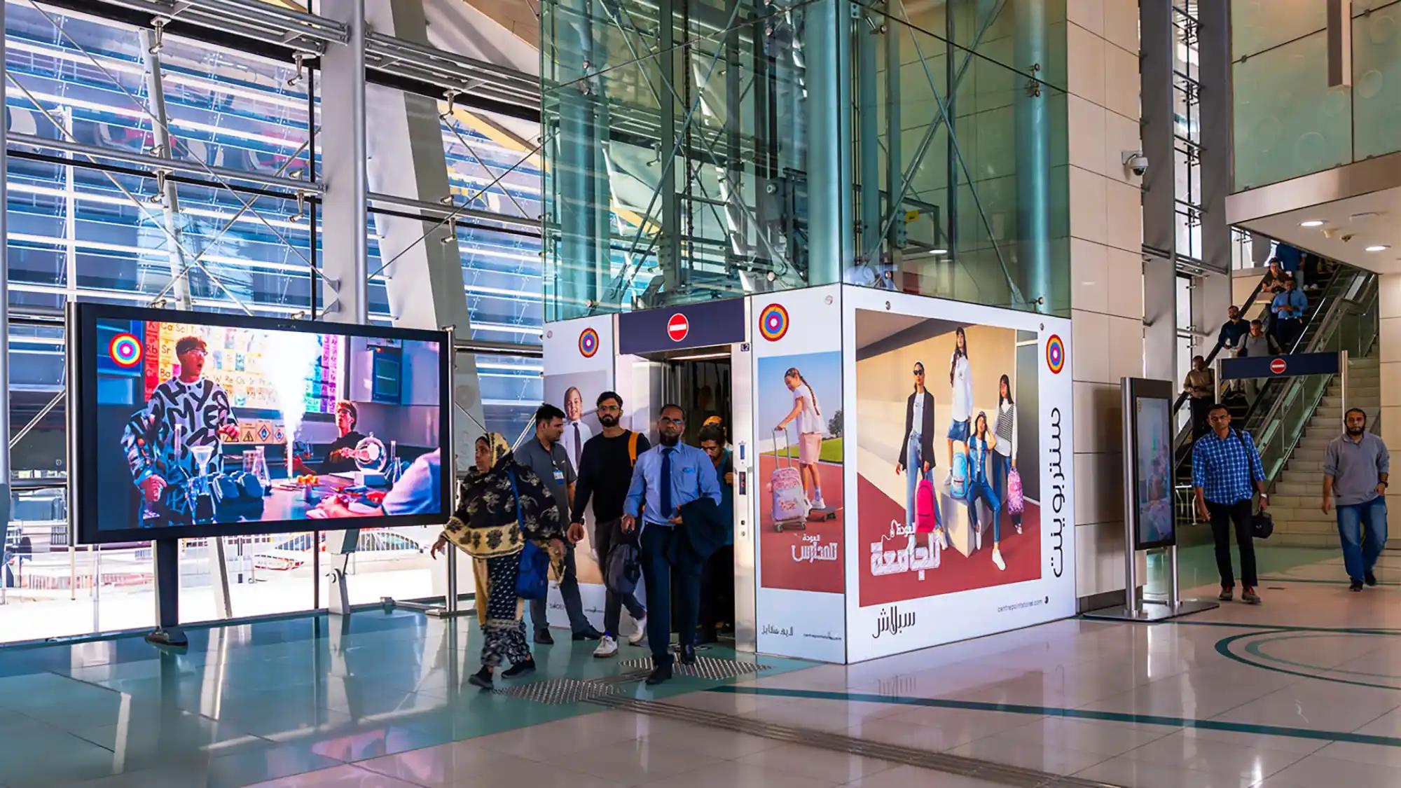 Eye-catching branding for Malabar Gold in the roof elements of a Dubai Metro station