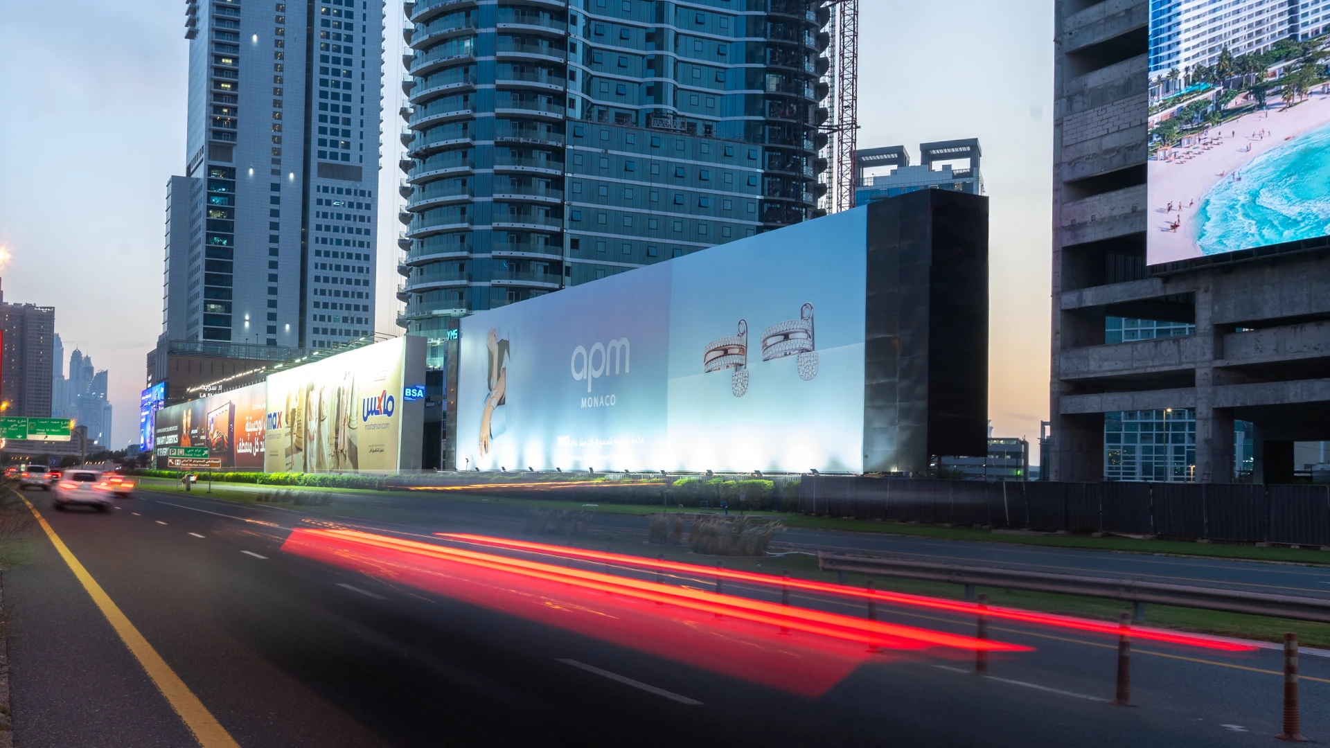 Binance Lampposts for TOKEN2049 with the Burj Al Arab in the background